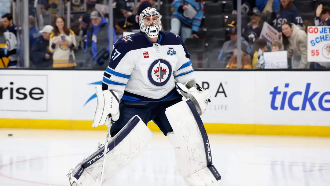 Connor Hellebuyck, ala-estrela do Winnipeg Jets, provavelmente nao vai comparecer ao treino de acampamento. Esse movime…