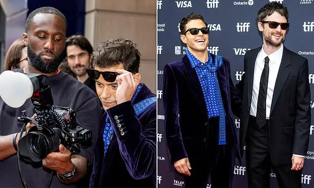 Rami Malek pediu para verificar a câmera de um fotógrafo no tapete vermelho da estreia do The Man I Love em Toronto. Es…
