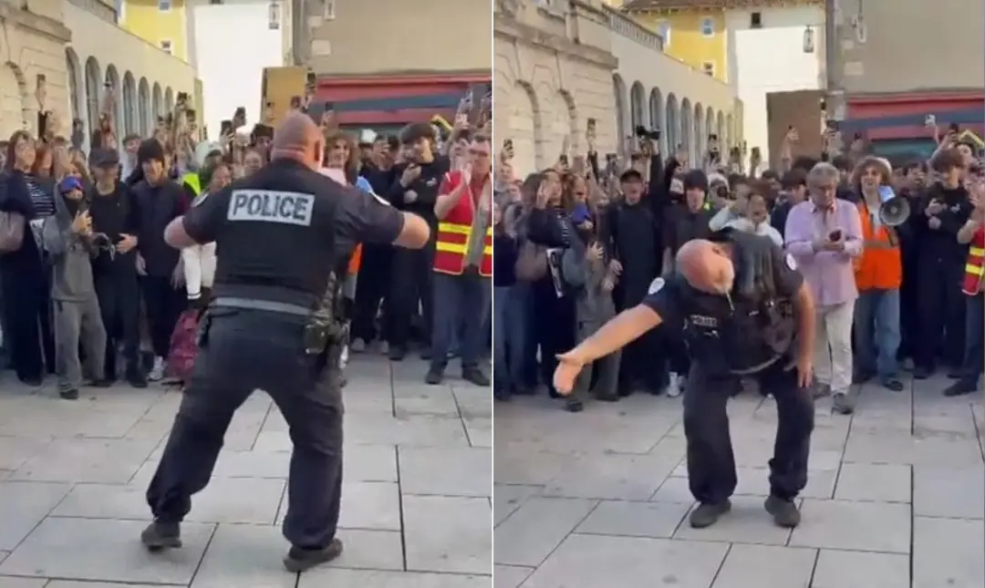 Mâcon, França. Um policial se juntou a estudantes em uma batalha de aura improvisada durante os protestos na cidade. É …