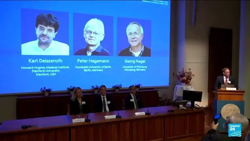 Karl Deisseroth e Peter Hegemann e Georg Nagel ganharam o Prêmio Nobel de Medicina 2026 por desenvolver optogenética, u…