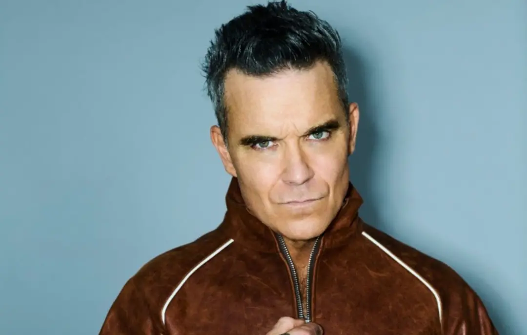Robbie Williams foi nomeado Icon de Álbum no National Album Day 2026. Esse reconhecimento, com 90 milhões de álbuns ven…