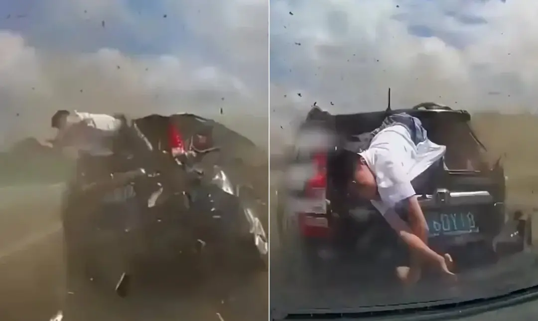 Rodovia Circular de Nanjing, na China, mãe e filho foram arremessados para fora do carro depois que o motorista desviou…