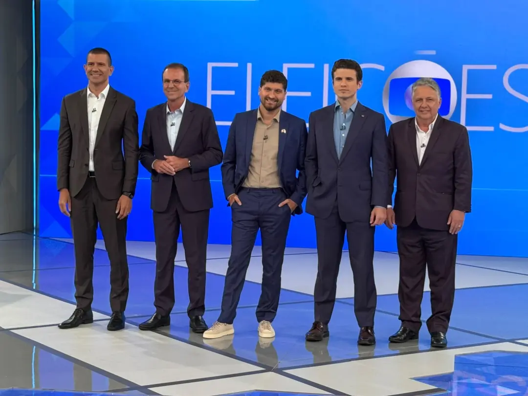 Debate no Rio teve ataques entre candidatos como Paes e Ruas sobre transporte e alianças. Muda prioridade depois da ele…