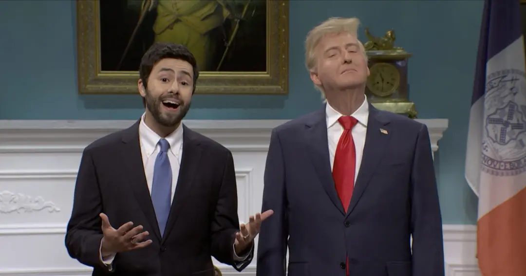 Saturday Night Live mostrou Ramy Youssef como o prefeito Zohran Mamdani recebendo Donald Trump. Essa aparição entre lad…