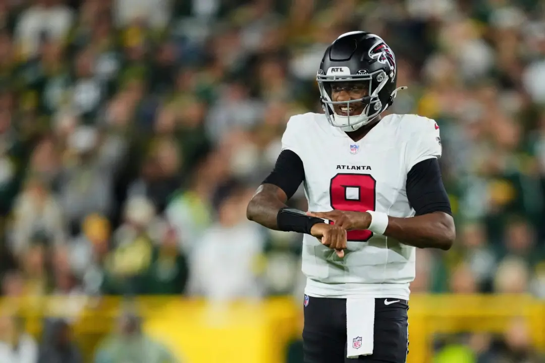Michael Penix Jr. retornou ao campo com os Atlanta Falcons contra os Green Bay Packers, mas o tempo de recuperação foi …