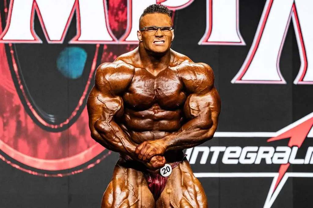 Nick Walker venceu o Mister Olympia 2026 na categoria Open. Os demais atletas, como Samson Dauda, fizeram parte do top …