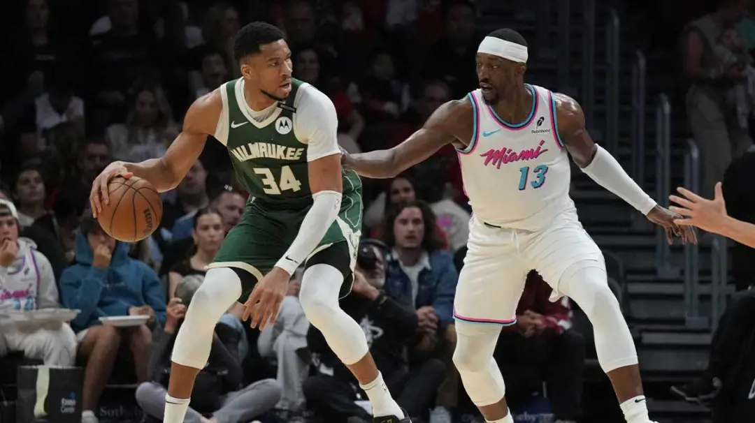 Bam Adebayo falou sobre o processo de construir química com Giannis Antetokounmpo, após o treino do Miami Heat em Boca …