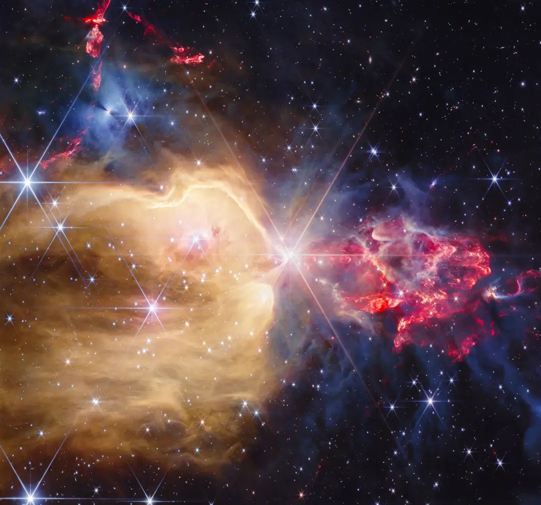 Webb revela protostars e estrelas nos gases luminosos de NGC 7129. Os gases quentes de hidrogênio atômico estão em dour…