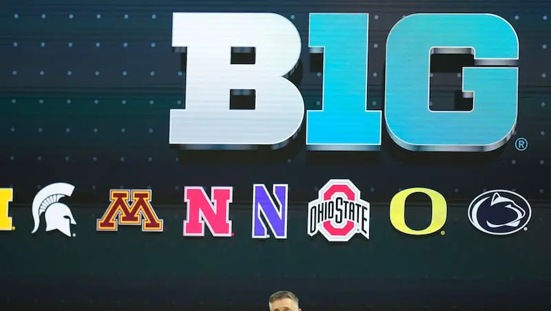 Tony Petitti diz que não rola conversa de expansão na Big Ten, mesmo com o limite de 20 escolas no projeto de lei. Ele …
